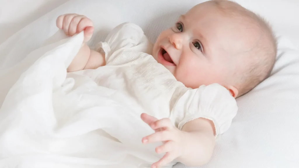 preparse espiritualmente para el bautismo- bebé con vestido de bautizo